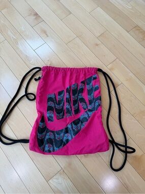 Nike Hot Pink Drawstring Bag with Black Floral Patterned Logo